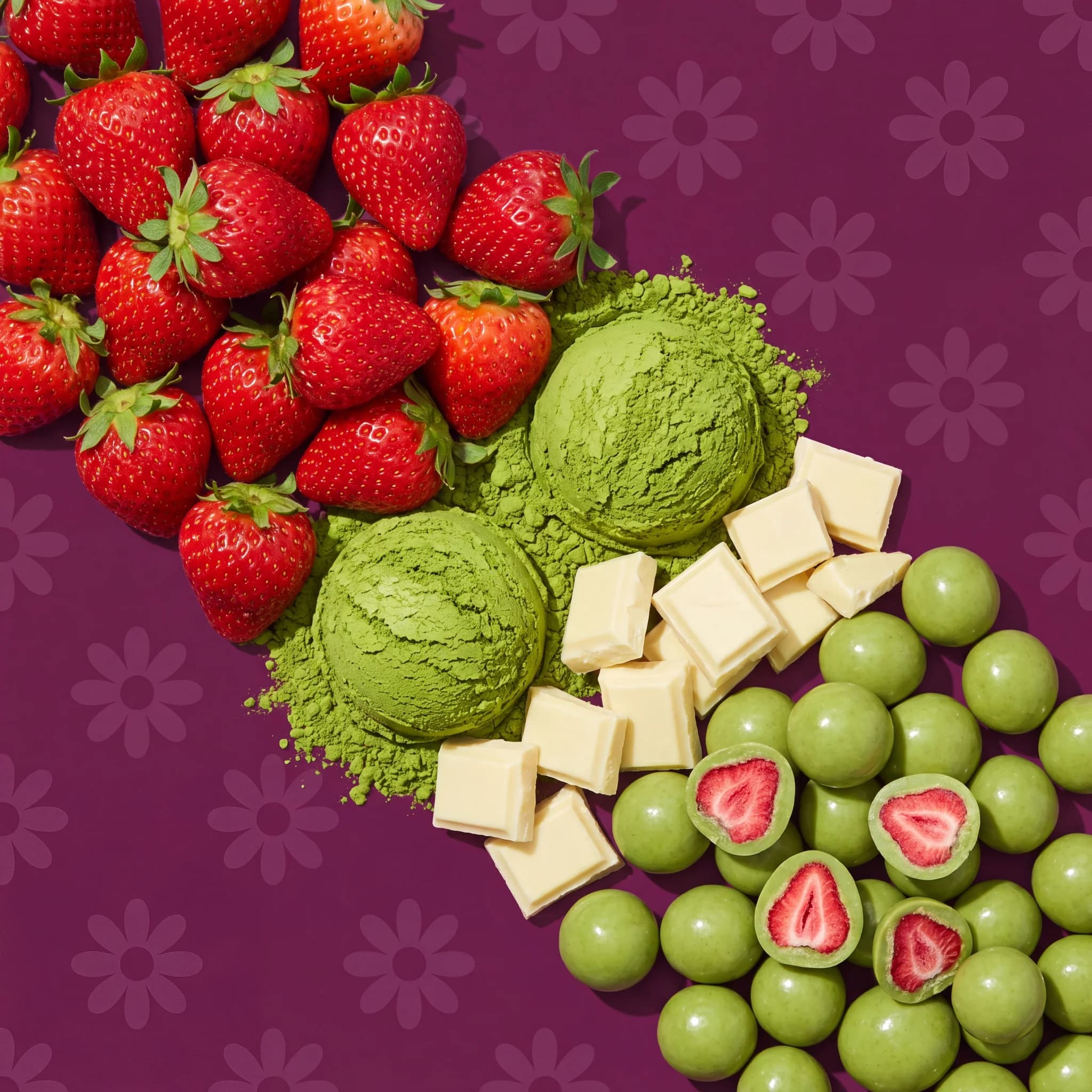 Strawberries, matcha powder and white chocolate flowing into green bites on plum