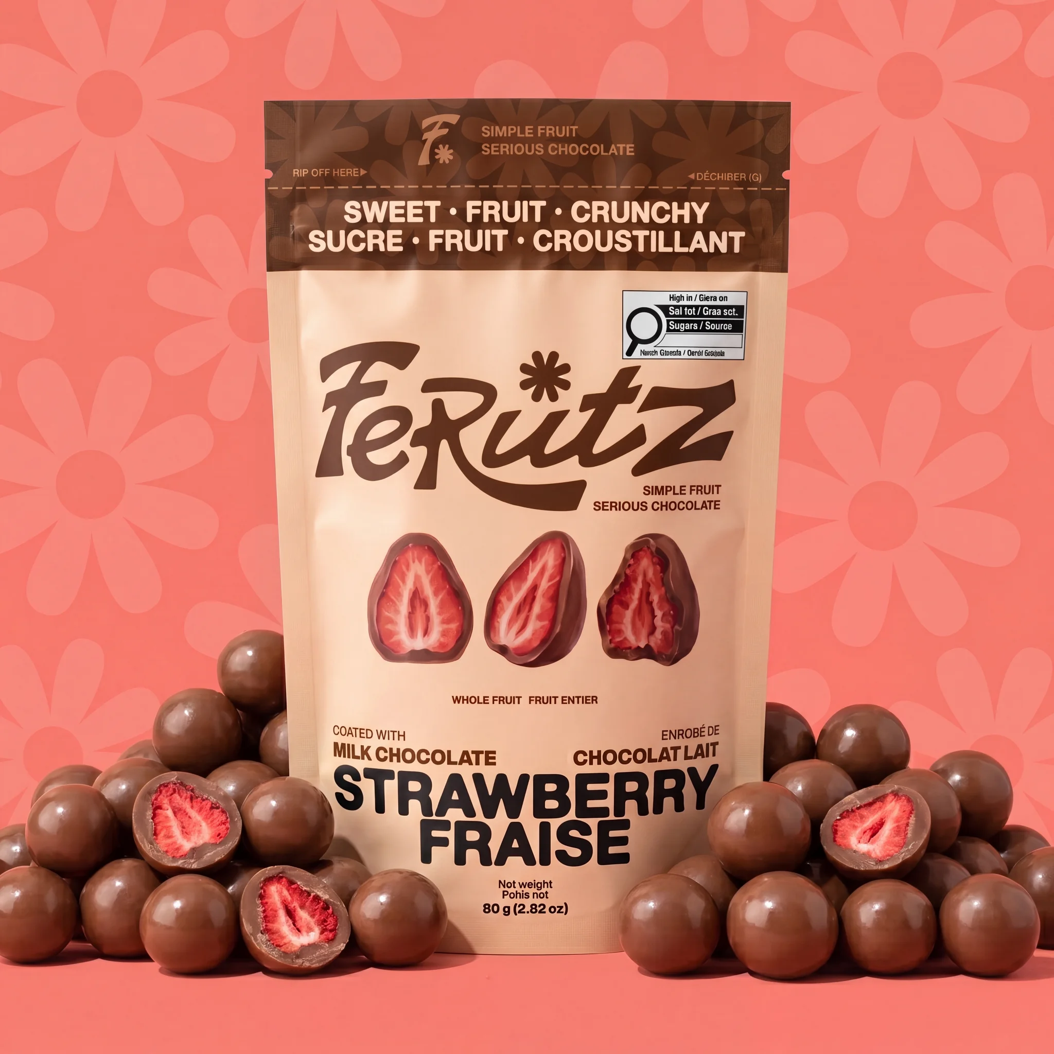 The milk chocolate strawberry bag standing between piles of bites on coral
